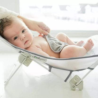 The First Years Sure Comfort Folding Baby Bather - Foldable Baby Bath Seat and Lounger for Home or On the Go - for Sink or...