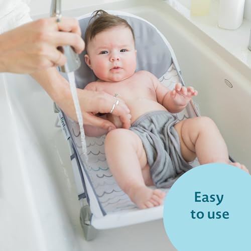 The First Years Sure Comfort Folding Baby Bather - Foldable Baby Bath Seat and Lounger for Home or On the Go - for Sink or...